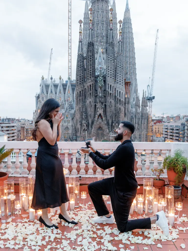 Sagrada Familia rooftop proposal setup in Barcelona showing floral arch and view 10