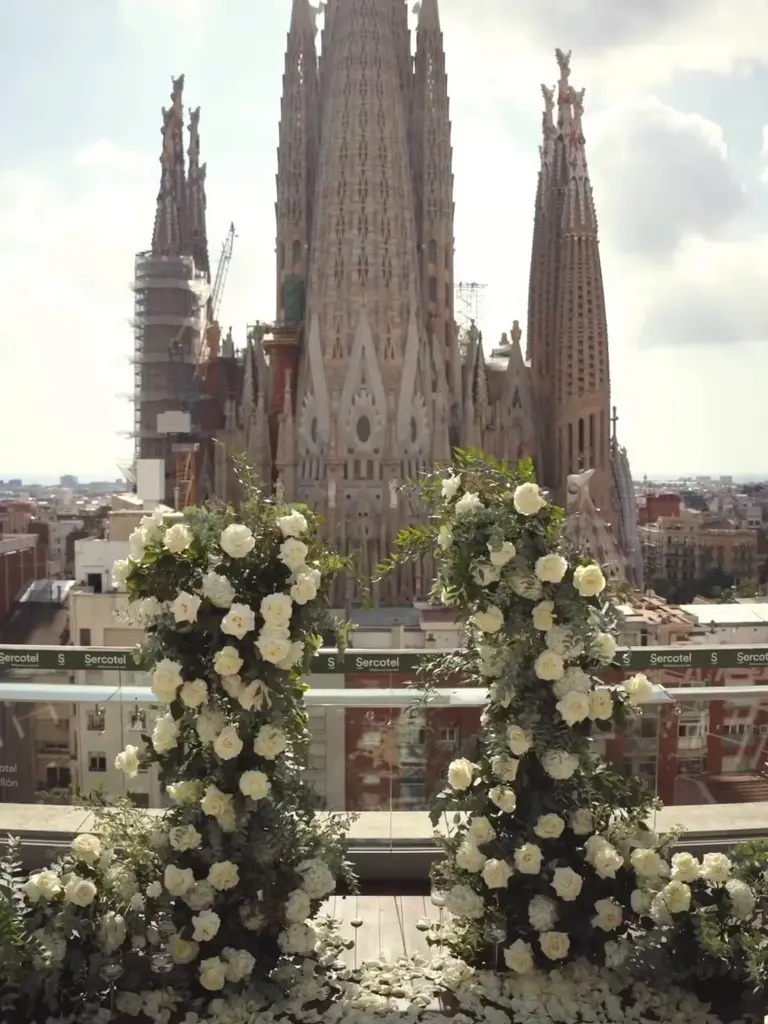 Sagrada Familia rooftop proposal setup in Barcelona showing floral arch and view 6