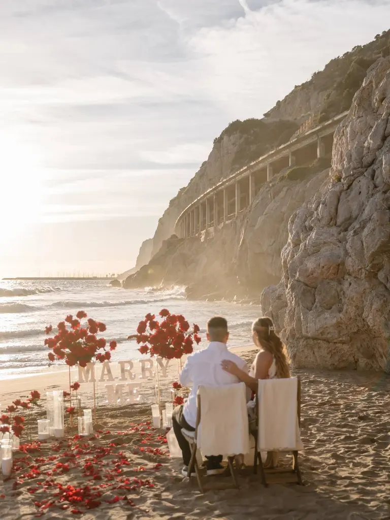 Sitges Sant Sebastia beach proposal setup view 3 during sunrise