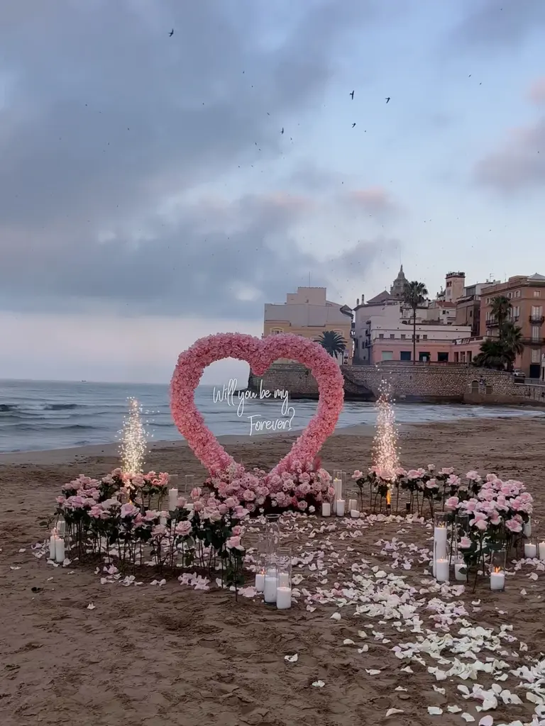 Sitges Sant Sebastia beach proposal setup view 4 during sunrise