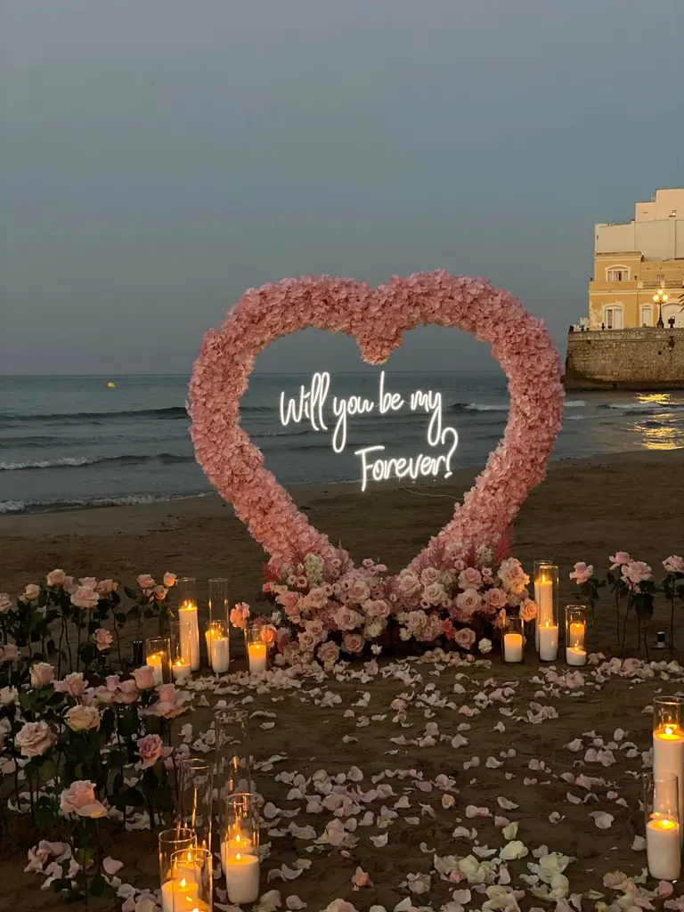 Sitges Sant Sebastia beach proposal setup view 5 during sunrise