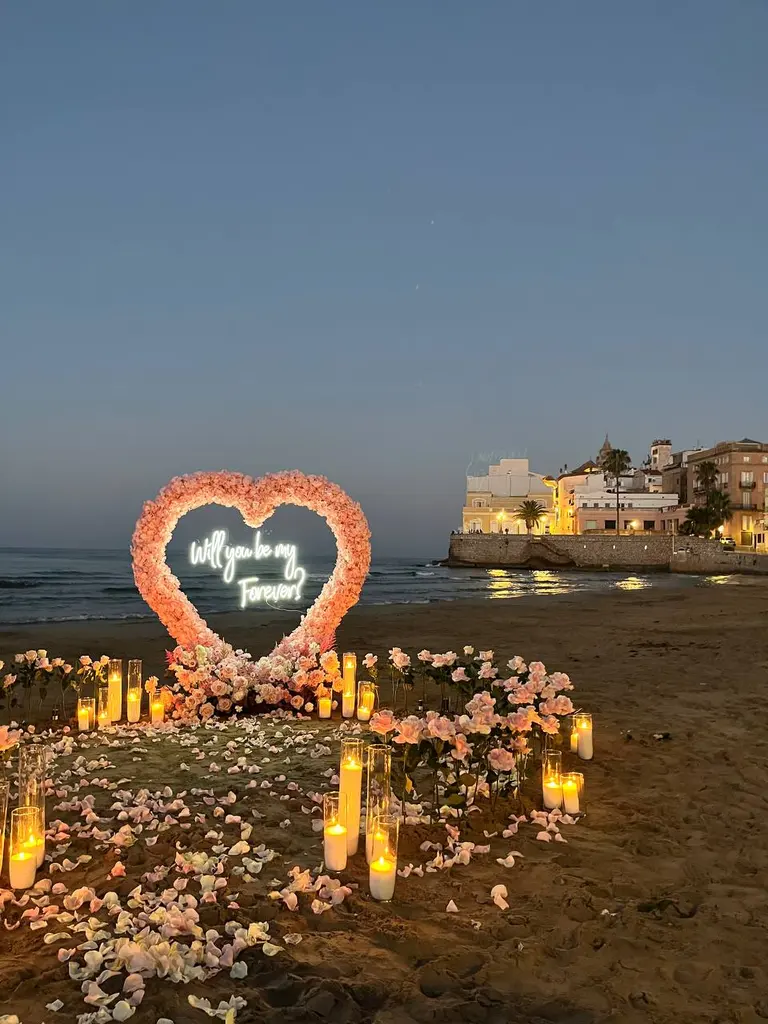 Sitges Sant Sebastia beach proposal setup view 7 during sunrise