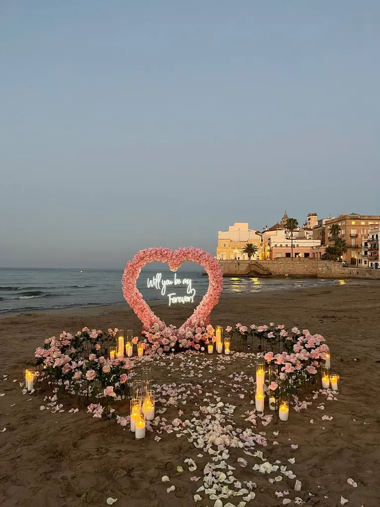 Sitges Sant Sebastia beach proposal setup view 8 during sunrise